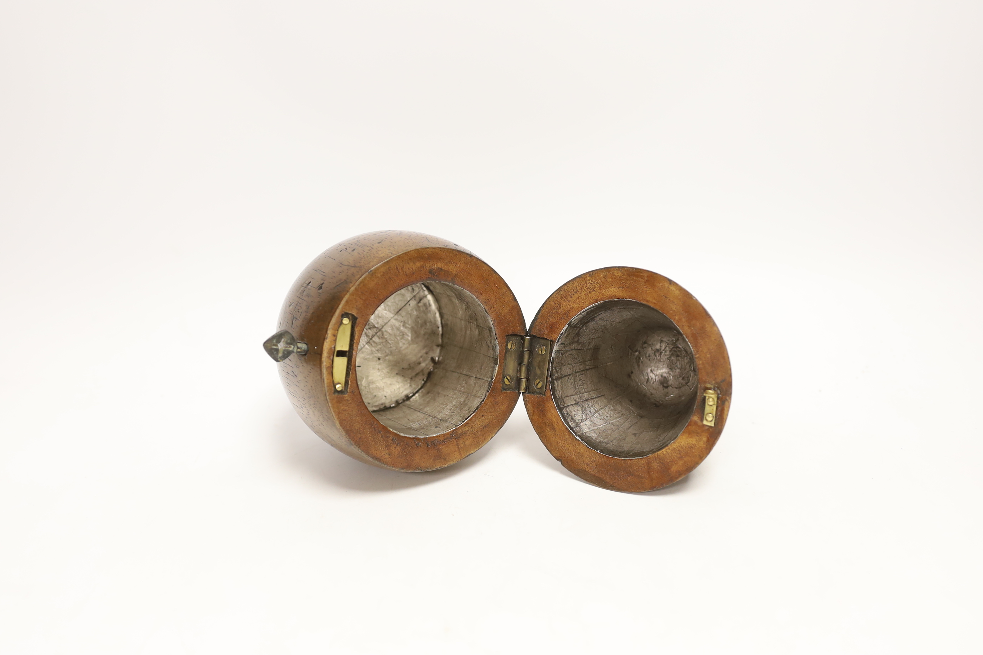 A treen pear shaped tea caddy, 18cm high